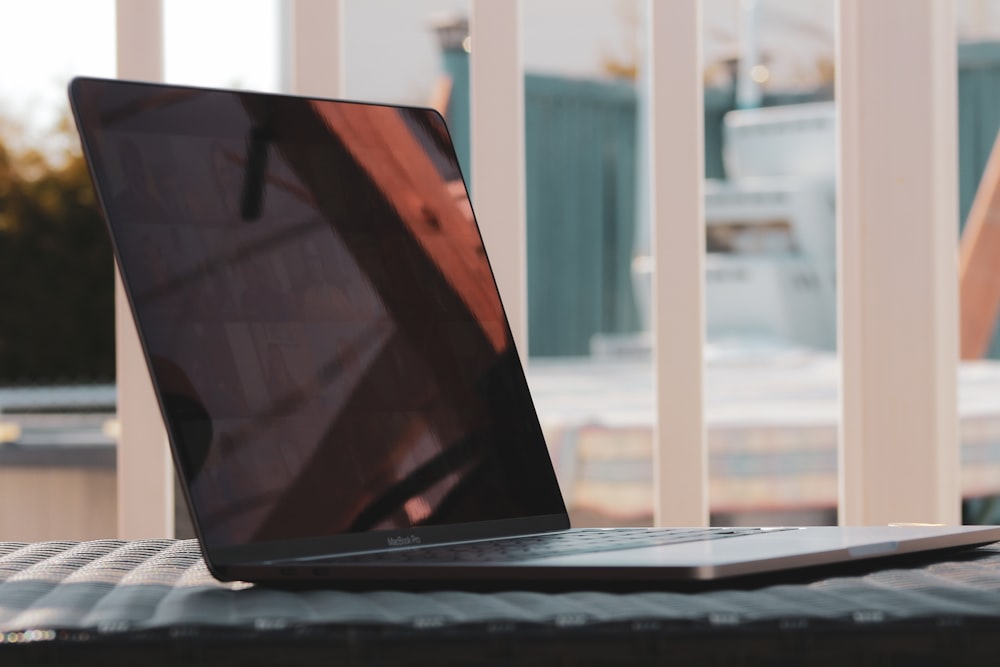 product-1-1 black laptop computer turned off